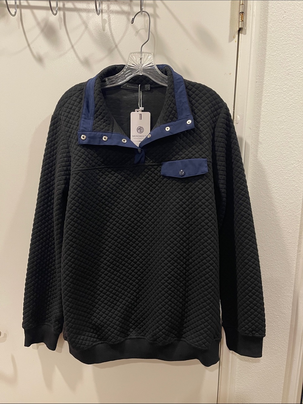 Black Quilted Pullover with Navy Snap Trim - Merokeety